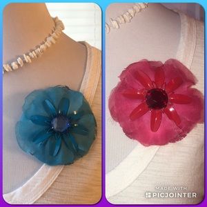 Pair of brooch flowers for clothing or hat.